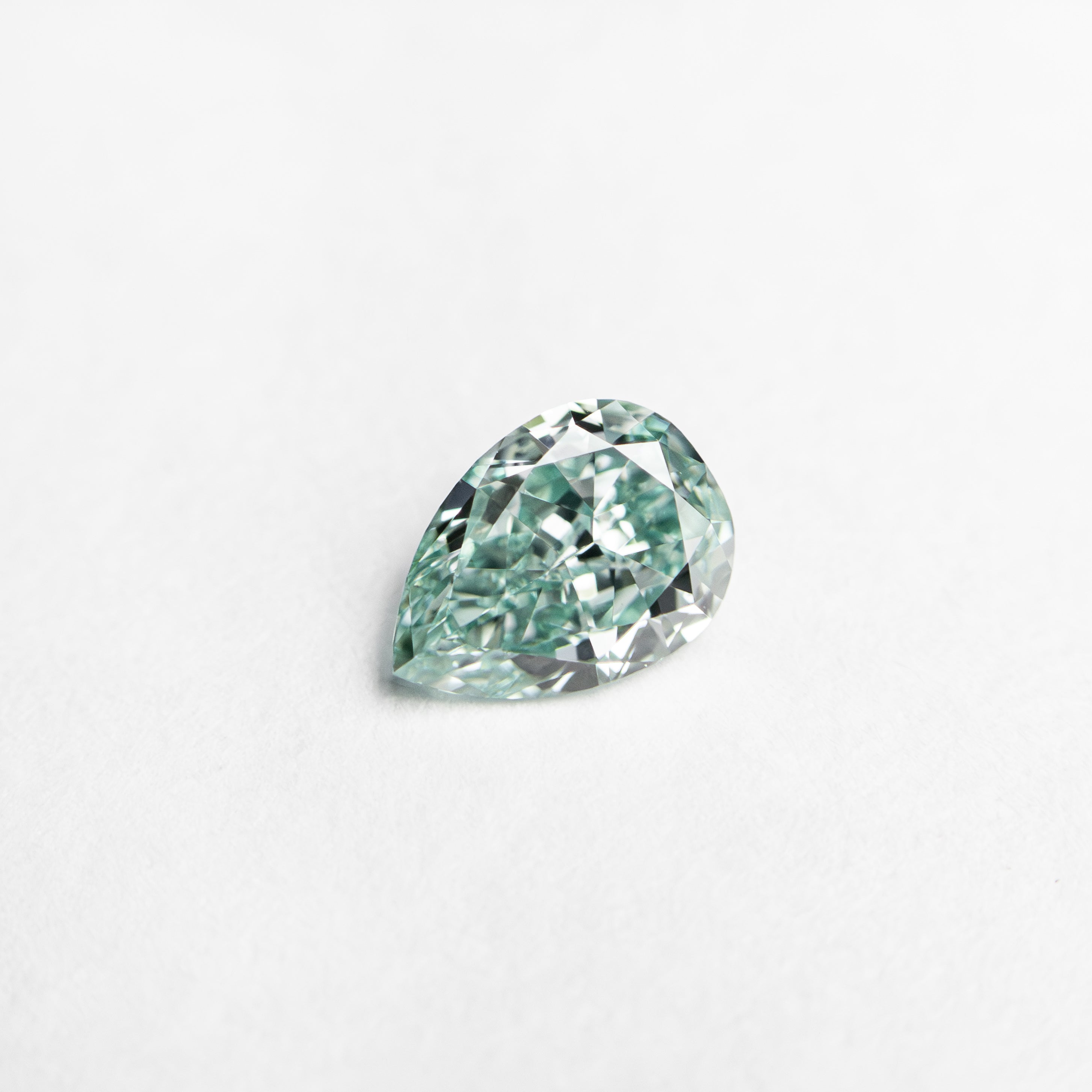 48x3 0.32ct 5.48x3.95x2.17mm GIA Fancy Vivid Bluish Green Pear Brilliant 24 ...